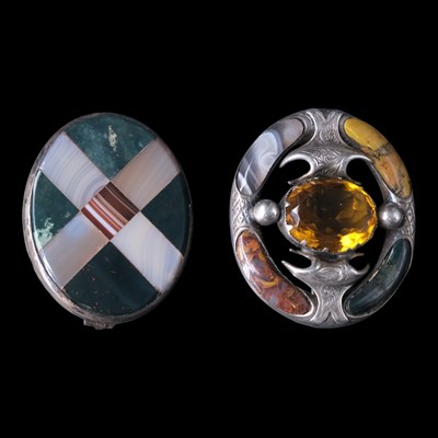 Lot 1243 - Two Victorian Scottish polished hardstone and...
