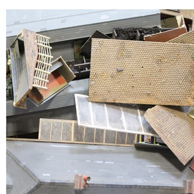 Lot 717 - A group of model railway trackside buildings,...