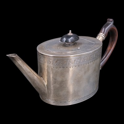 Lot 1130 - A Victorian silver teapot of oval form, the...