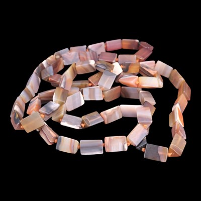 Lot 1436 - An early 20th Century banded agate lariat...
