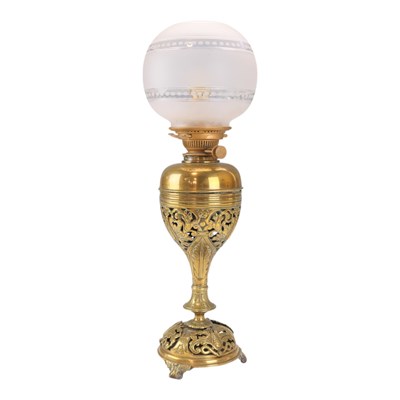 Lot 890 - A late-Victorian brass oil lamp, having a...