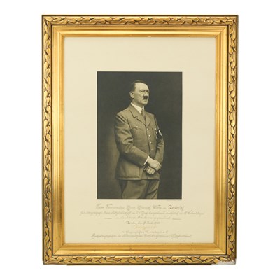 Lot 135 - A large photogravure three-quarter length...