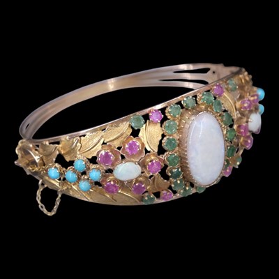 Lot 1377 - A mid 20th Century opal, emerald, ruby,...