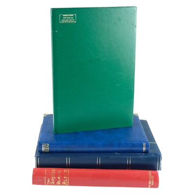 Lot 426 - Three stockbooks and an album of GB and world...