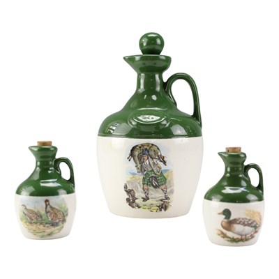 Lot 981 - A Montrose Potteries whisky decanter, together...