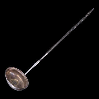 Lot 1097 - A baleen-handled silver punch ladle, its bowl...
