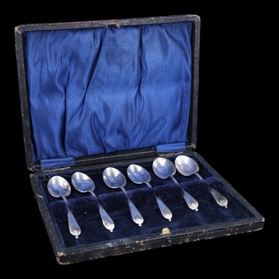 Lot 1148 - A set of six 1930s silver coffee spoons, Raeno...