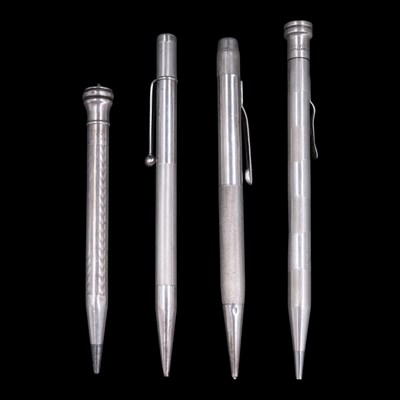 Lot 1155 - Four mid 20th Century silver propelling...