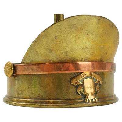 Lot 175 - A Great War "trench art" peaked cap, 10.2 cm