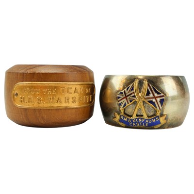 Lot 176 - A wooden napkin ring fashioned "from the teak...