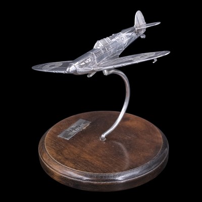 Lot 1157 - A 1980s limited edition silver Spitfire MK 1A,...