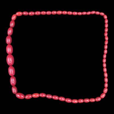 Lot 1431 - A vintage faux cherry-amber oval beaded...