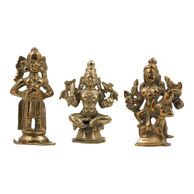 Lot 956 - Three brass Indian figures of Hindu gods /...