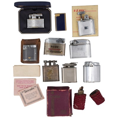 Lot 523 - A group of vintage petrol lighters, including...
