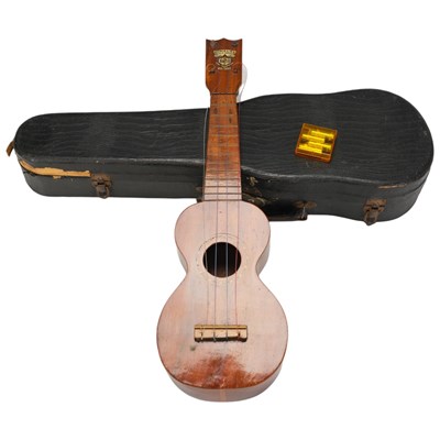 Lot 662 - A vintage Kumalae ukulele, bearing a "Hawaii...