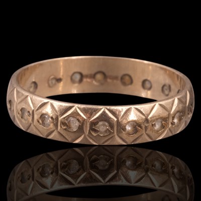 Lot 1380 - A 1980s white gemstone and 9 ct gold...