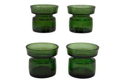Lot 1056 - Four Dansk green glass candle holders by Jens...