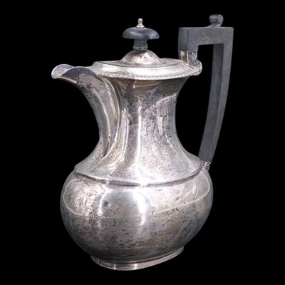 Lot 1160 - A 1930s silver coffee pot, having a planar...