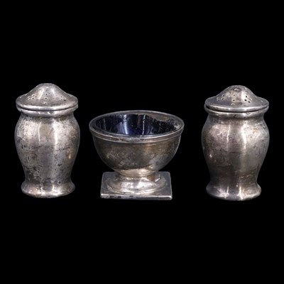 Lot 1164 - A pair of George V silver pepperettes,...
