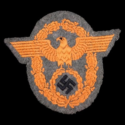 Lot 82 - A German Third Reich rural police embroidered...