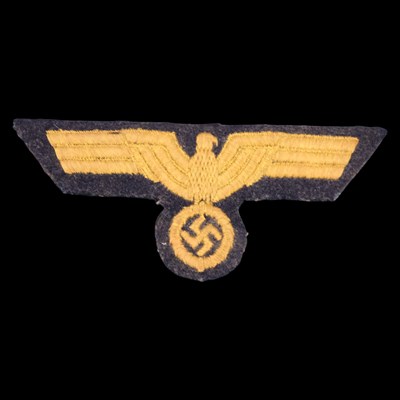 Lot 93 - A German Third Reich Kriegsmarine woven tunic...