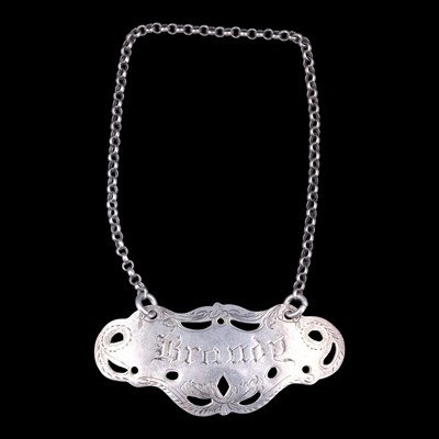 Lot 1104 - A Victorian silver brandy decanter label, Grey...