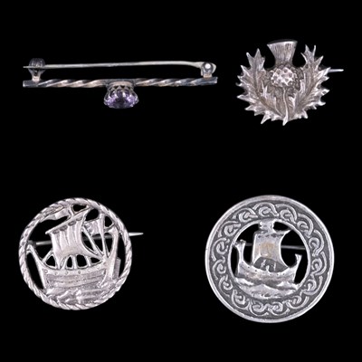 Lot 1229 - An early 1970s amethyst and silver bar brooch...