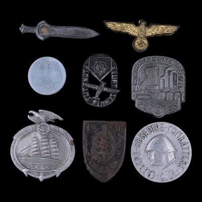 Lot 122 - A group of German Third Reich cap and day...