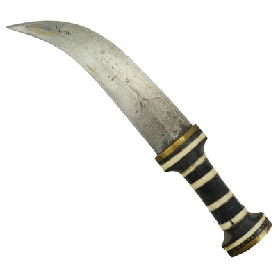 Lot 245 - A kindjal dagger, having a brass, horn and...