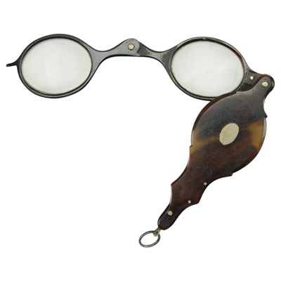 Lot 640 - A Victorian tortoiseshell lorgnette