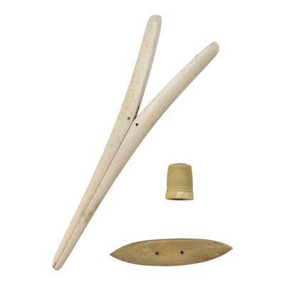 Lot 783 - A Victorian bone glove stretcher, a bone...