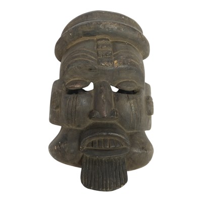 Lot 931 - A West African Ibibio idiok ekpo mask, carved...