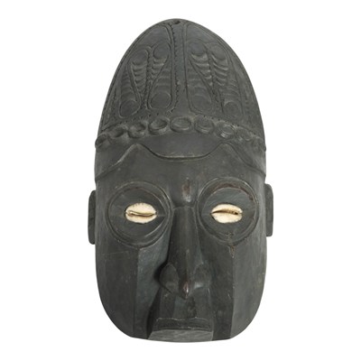 Lot 932 - A Papua New Guinean mask, having cowrie shell...