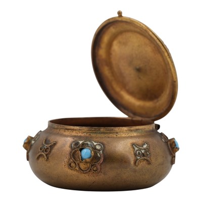 Lot 865 - A small brass oblate hinge-lidded box,...