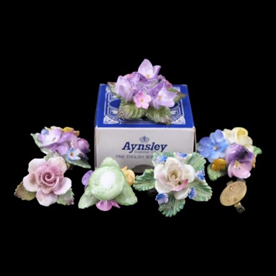 Lot 1419 - A group of vintage bone china floral brooches