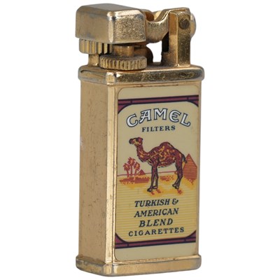 Lot 522 - A vintage lady's Camel cigarette lighter by...