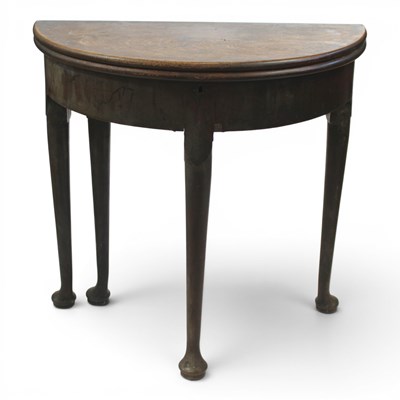 Lot 1579 - A Georgian mahogany half-moon turn-over-top...