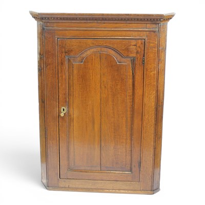 Lot 1580 - A George III oak hanging corner...