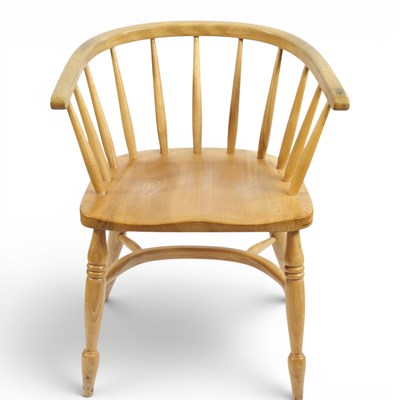 Lot 1581 - A near contemporary Windsor armchair, having a...