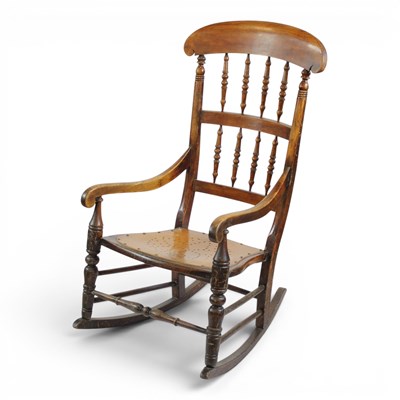 Lot 1587 - A late 19th Century spindle-back rocking chair