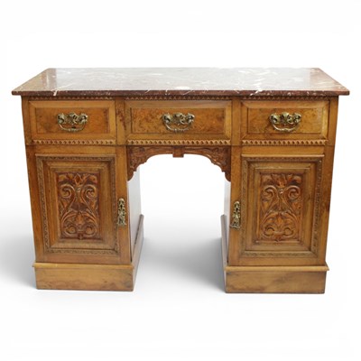 Lot 1600 - A fine Victorian marble-topped carved walnut...