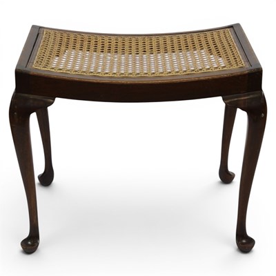 Lot 1605 - A 1930s caned-seated mahogany dressing table...