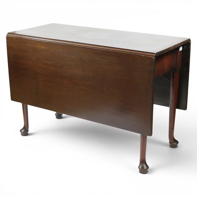 Lot 1623 - A George III mahogany drop-leaf dining...