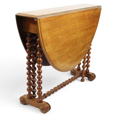 Lot 1660 - A fine walnut drop-leaf table, having an oval...