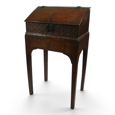 Lot 1672 - A Charles II oak desk box and later joined-oak...