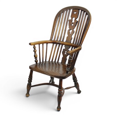 Lot 1679 - A 19th Century Windsor armchair, having a...