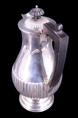 Lot 752 - An early 20th Century silver four-piece tea...