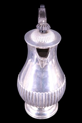Lot 752 - An early 20th Century silver four-piece tea...