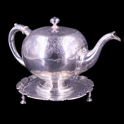 Lot 826 - A George II Scottish silver teapot and stand,...