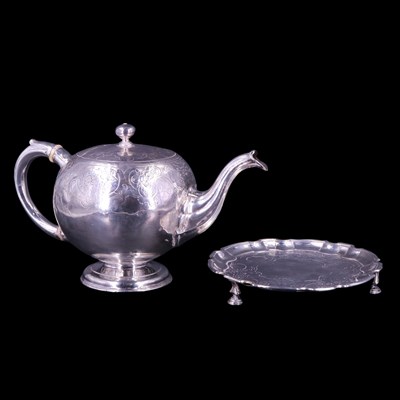 Lot 826 - A George II Scottish silver teapot and stand,...
